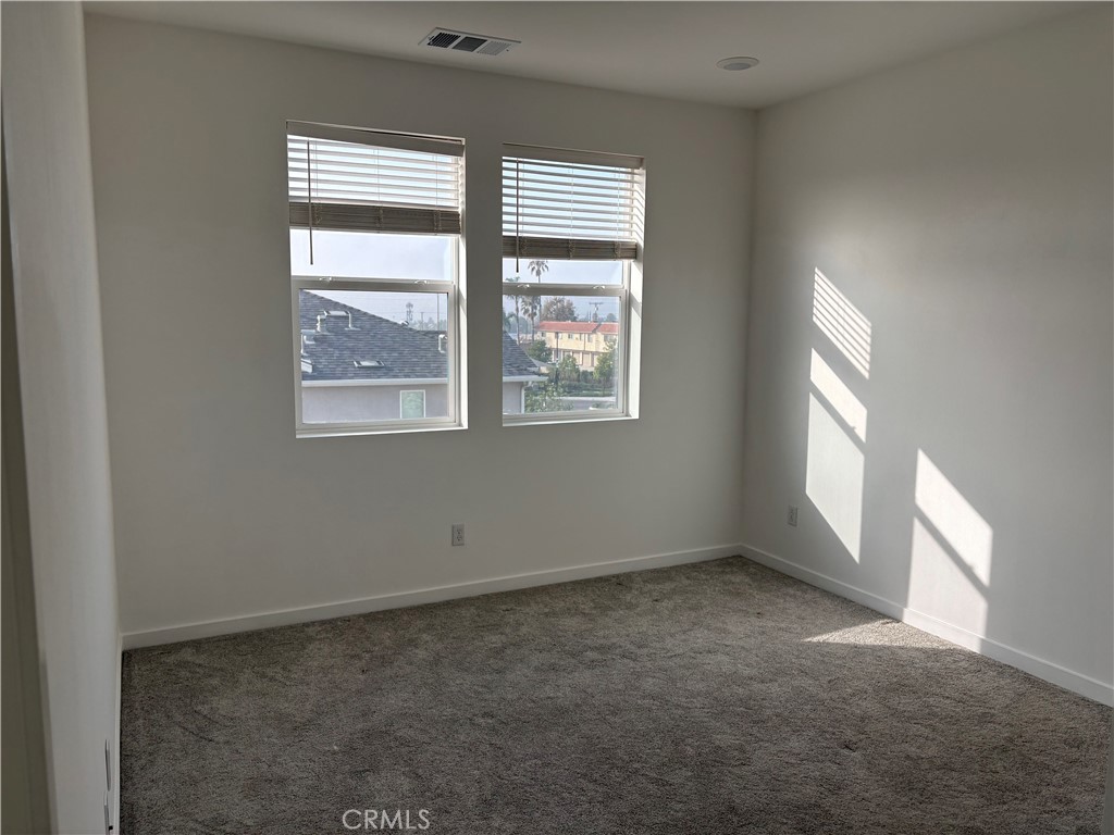 1368 Anise Way Upland, CA 91786 - Photo 13 of 20 an empty room with a window