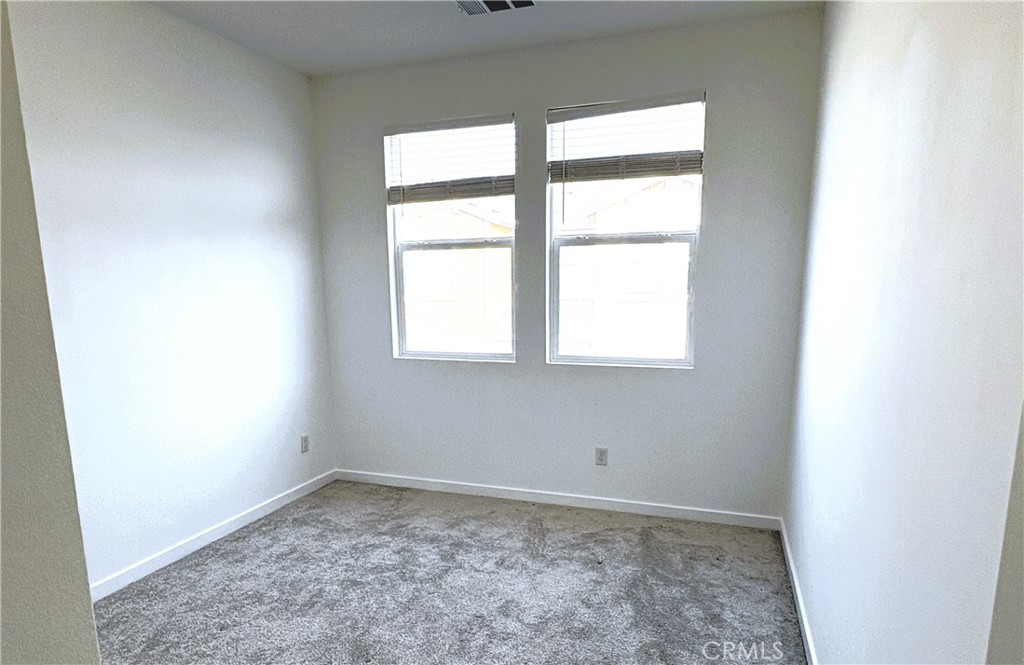 1368 Anise Way Upland, CA 91786 - Photo 19 of 20 an empty room with a window
