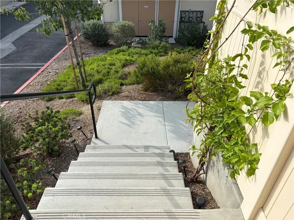 a view of wooden floor and cabinet in a room