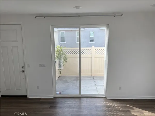 a kitchen with a sink and a refrigerator