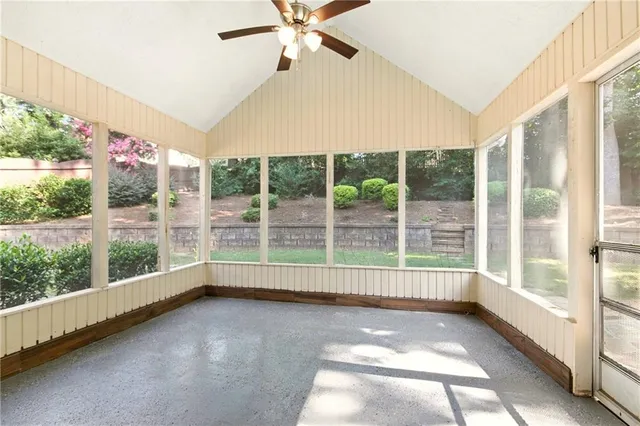 a view of a room with window and a floor to ceiling window