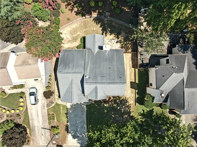 an aerial view of residential house with outdoor space