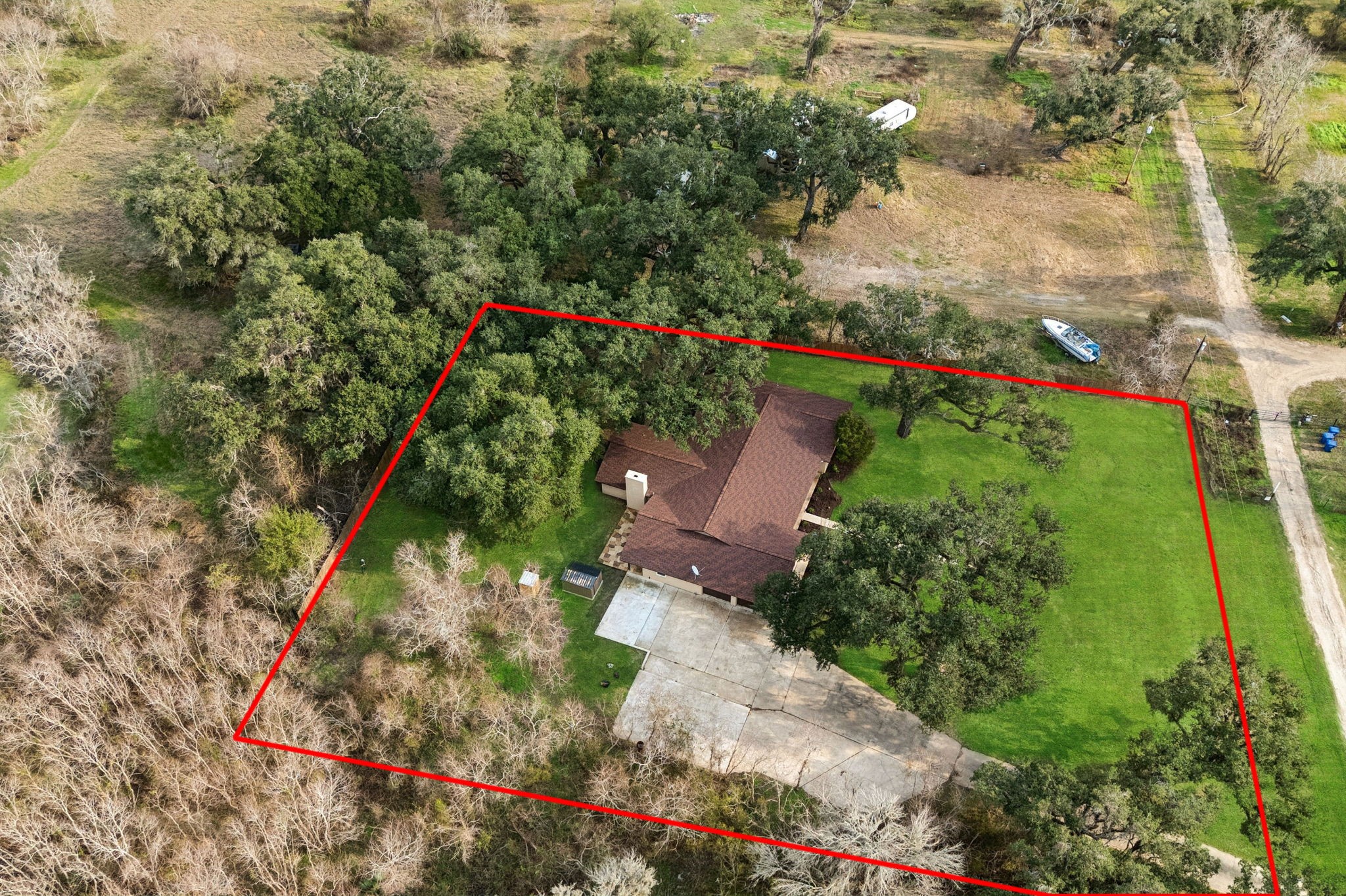 185 Hunters Lane Sweeny, TX 77480 - Photo 20 of 22 an aerial view of a house with a yard