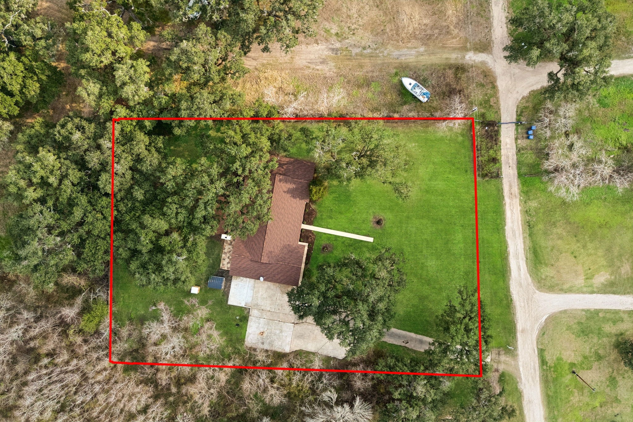 185 Hunters Lane Sweeny, TX 77480 - Photo 21 of 22 an aerial view of a residential houses with outdoor space and trees all around