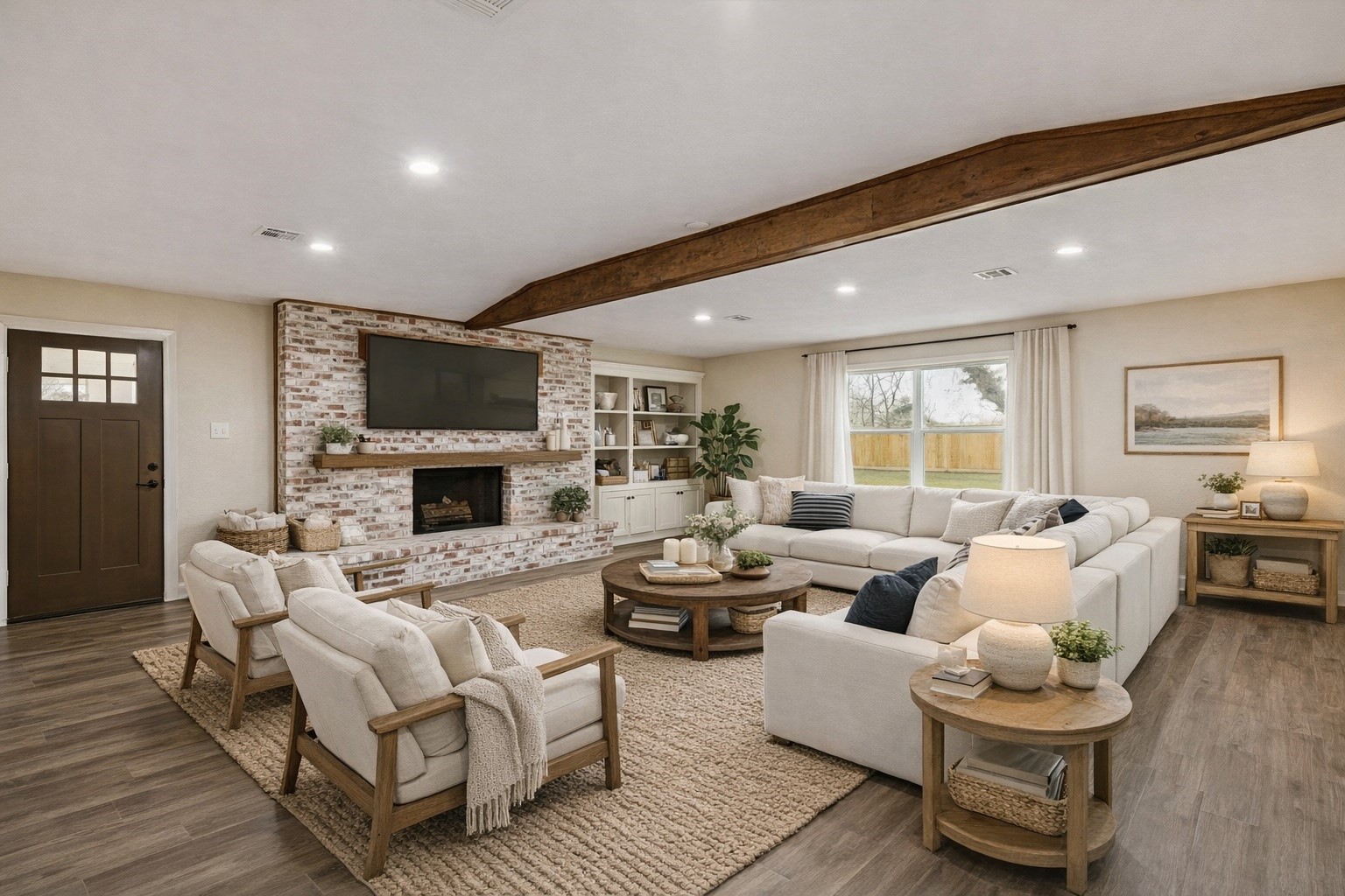 185 Hunters Lane Sweeny, TX 77480 - Photo 6 of 22 a living room with fireplace furniture and a flat screen tv