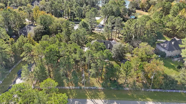 a backyard of a house with a yard with outdoor seating