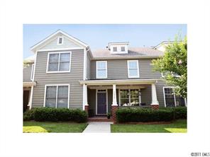 1035 Market Street, Unit 1035 Fort Mill, SC 29708 - Photo 1 of 16 a front view of a house with garden