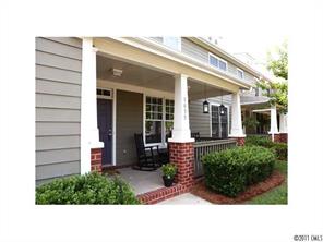 1035 Market Street, Unit 1035 Fort Mill, SC 29708 - Photo 2 of 16 a front view of a house with a porch