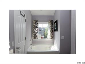 1035 Market Street, Unit 1035 Fort Mill, SC 29708 - Photo 12 of 16 a black and white photo of a bathroom
