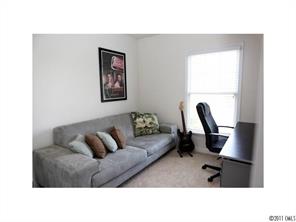 1035 Market Street, Unit 1035 Fort Mill, SC 29708 - Photo 14 of 16 a living room with furniture and a window