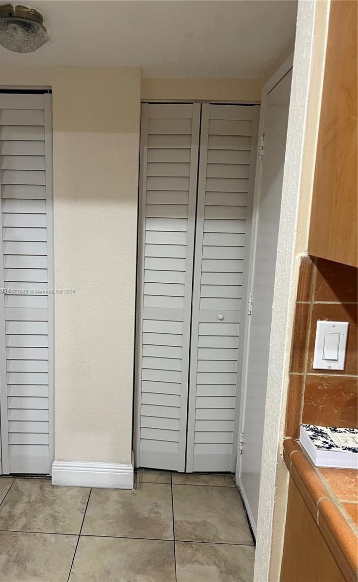 8875 Fontainebleau Boulevard, Unit 203 Miami, FL 33172 - Photo 18 of 22 a view of a storage & utility room