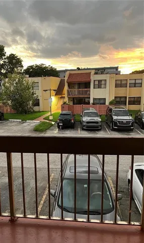 a view of swimming pool from a balcony