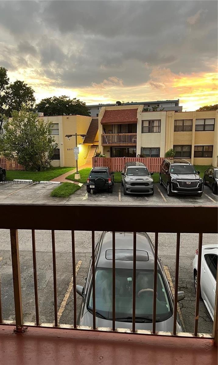 8875 Fontainebleau Boulevard, Unit 203 Miami, FL 33172 - Photo 2 of 22 a view of swimming pool from a balcony