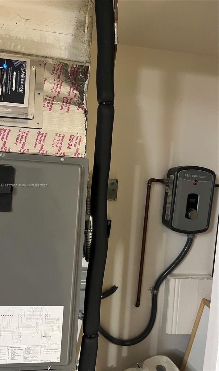 8875 Fontainebleau Boulevard, Unit 203 Miami, FL 33172 - Photo 21 of 22 a view of water heater room
