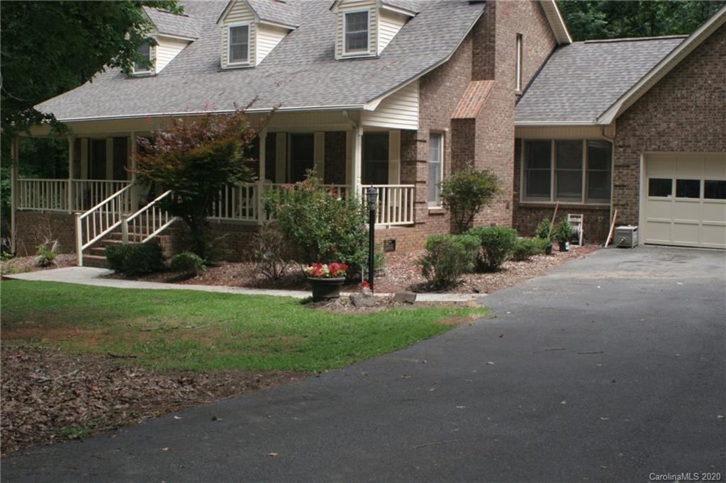 1160 Ben Black Road Midland, NC 28107 - Photo 1 of 28 a view of a house with backyard garden and a tree