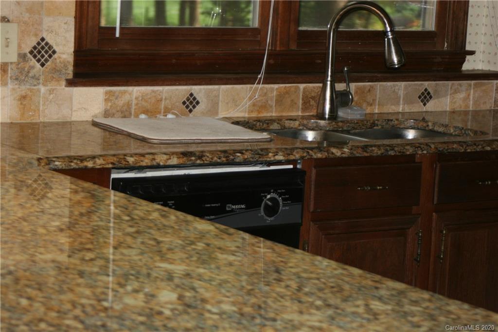 1160 Ben Black Road Midland, NC 28107 - Photo 18 of 28 a close view of sink and tap