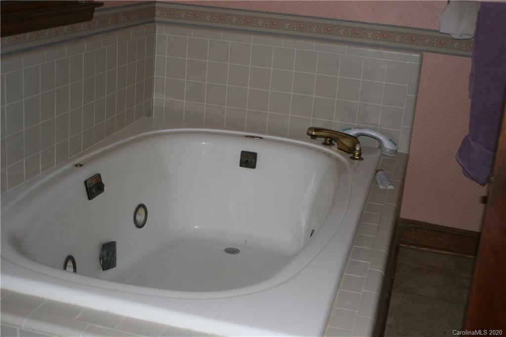 1160 Ben Black Road Midland, NC 28107 - Photo 22 of 28 a bathroom with a tub