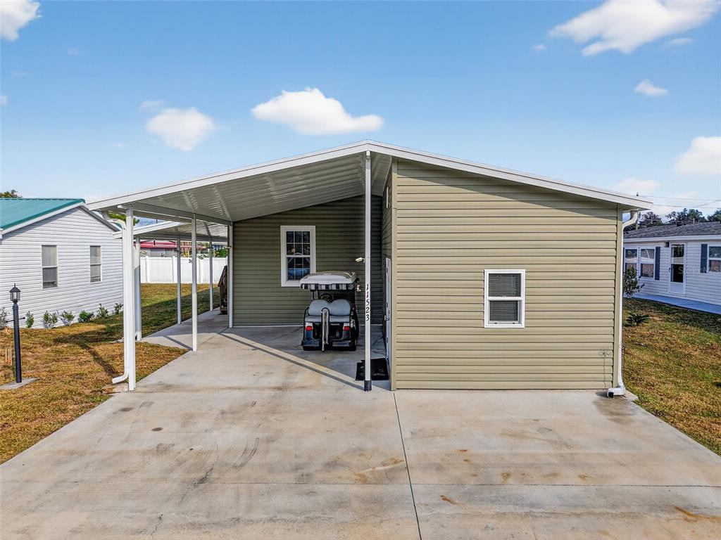11523 Marvell Way Leesburg, FL 34788 - Photo 2 of 40 a view of a house with backyard