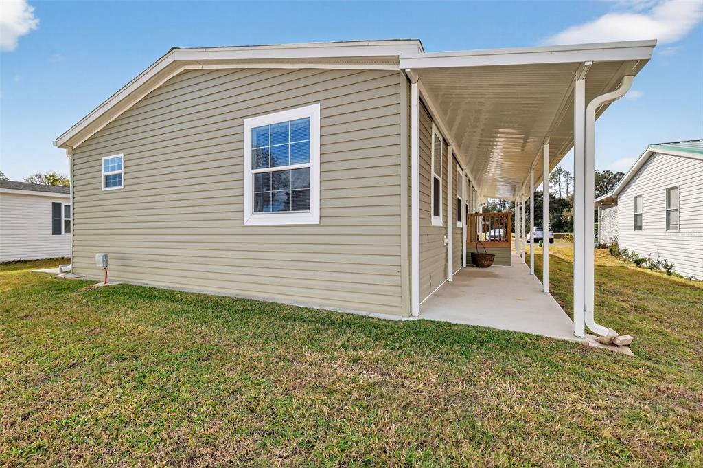 11523 Marvell Way Leesburg, FL 34788 - Photo 26 of 40 a view of a house with a backyard