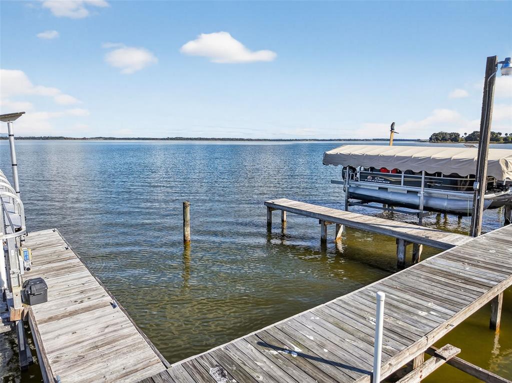 11523 Marvell Way Leesburg, FL 34788 - Photo 31 of 40 a view of a balcony with two chairs