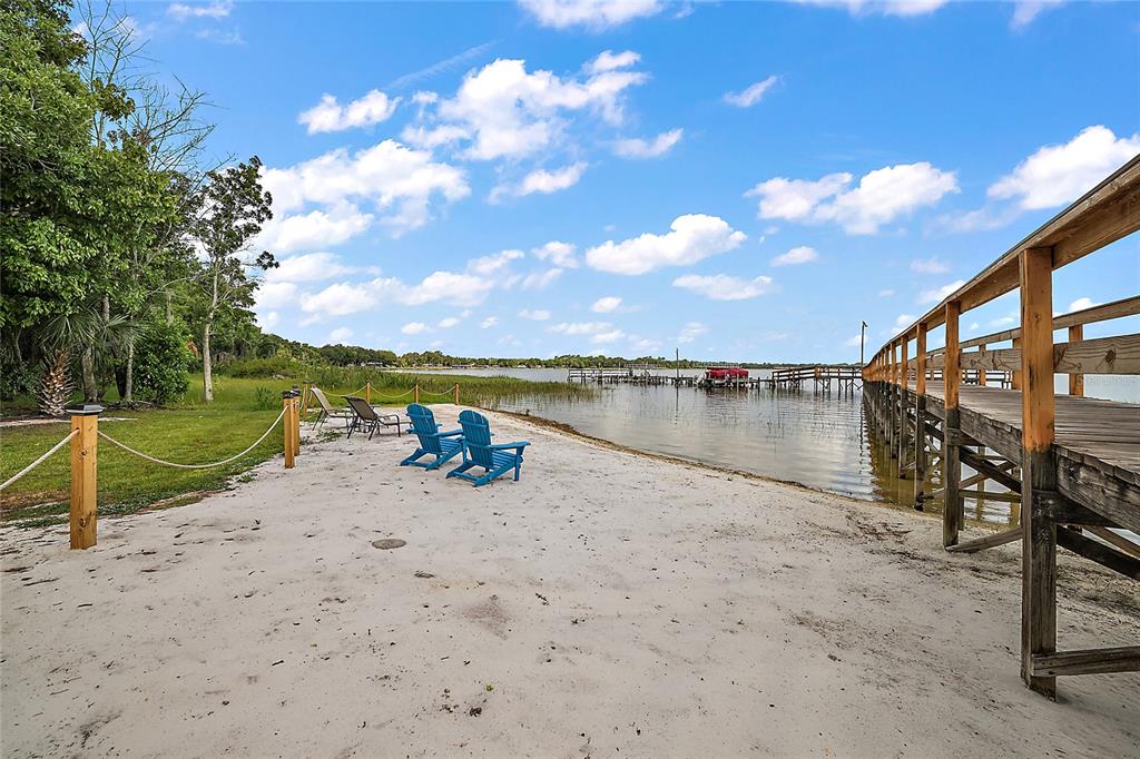 11523 Marvell Way Leesburg, FL 34788 - Photo 33 of 40 a view of a lake with a yard