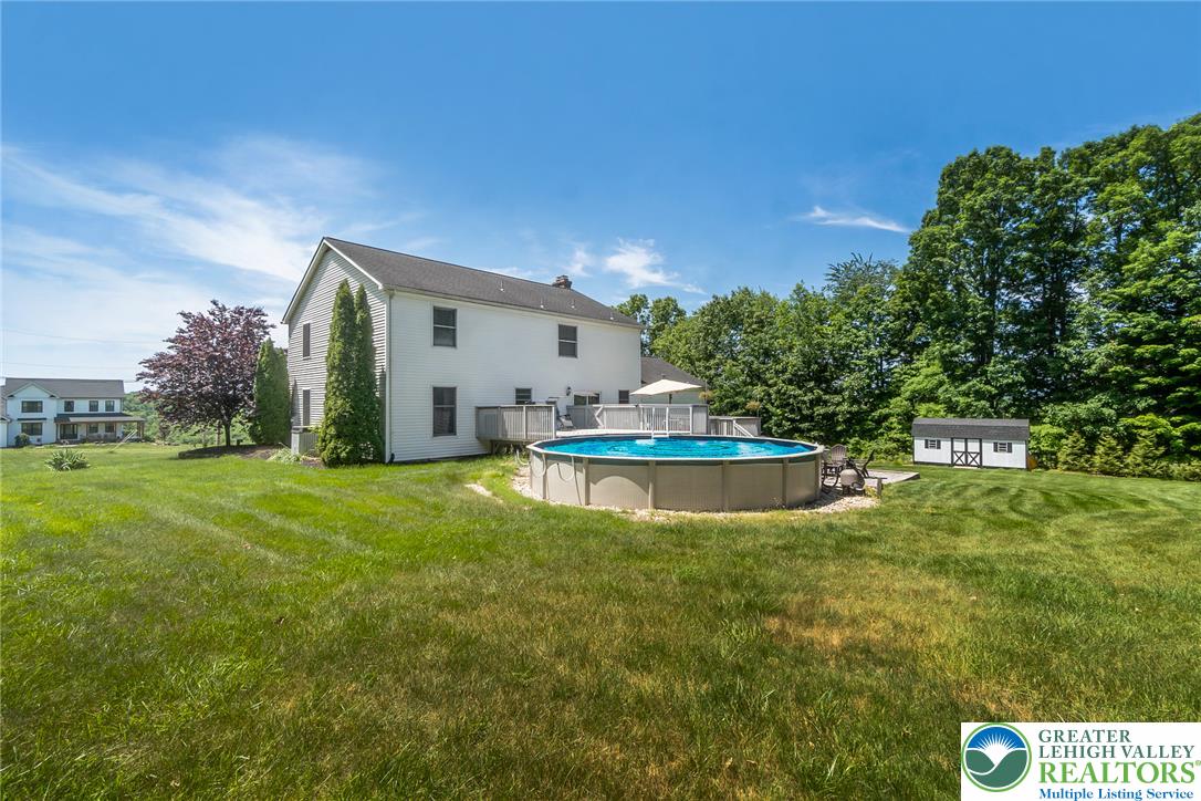 9461 Red Road Kempton, PA 19529 - Photo 42 of 55 A spacious yard provides ample room for an above-ground pool and outdoor entertainment.