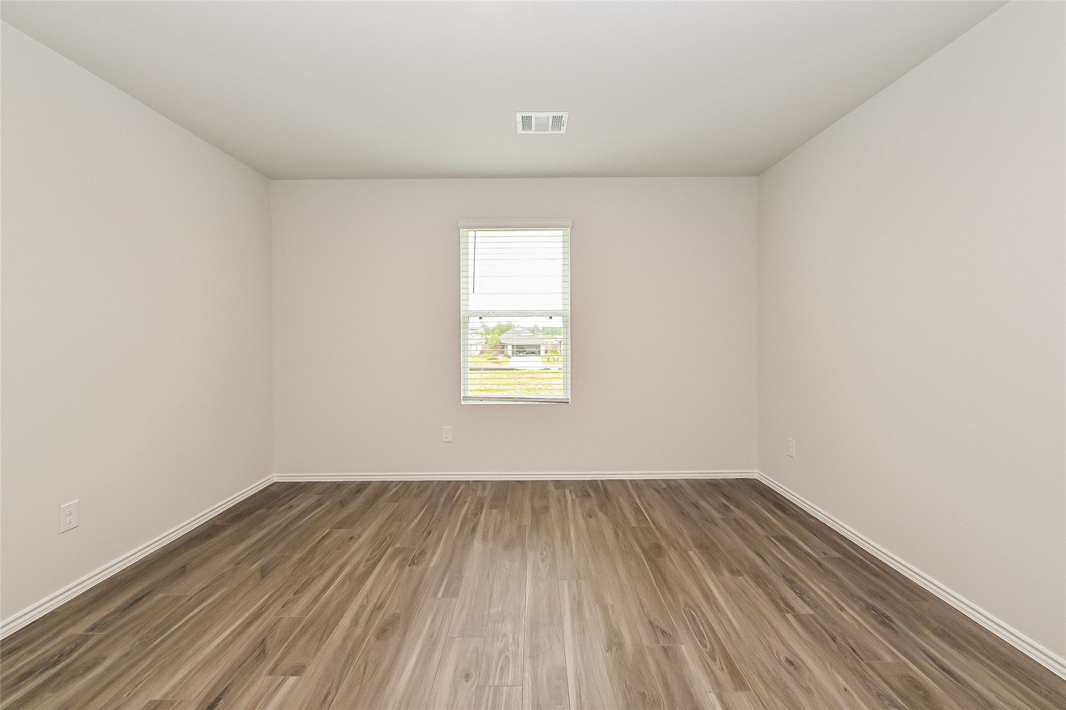 1128 Copal Trail Conroe, TX 77301 - Photo 12 of 22 an empty room with a window