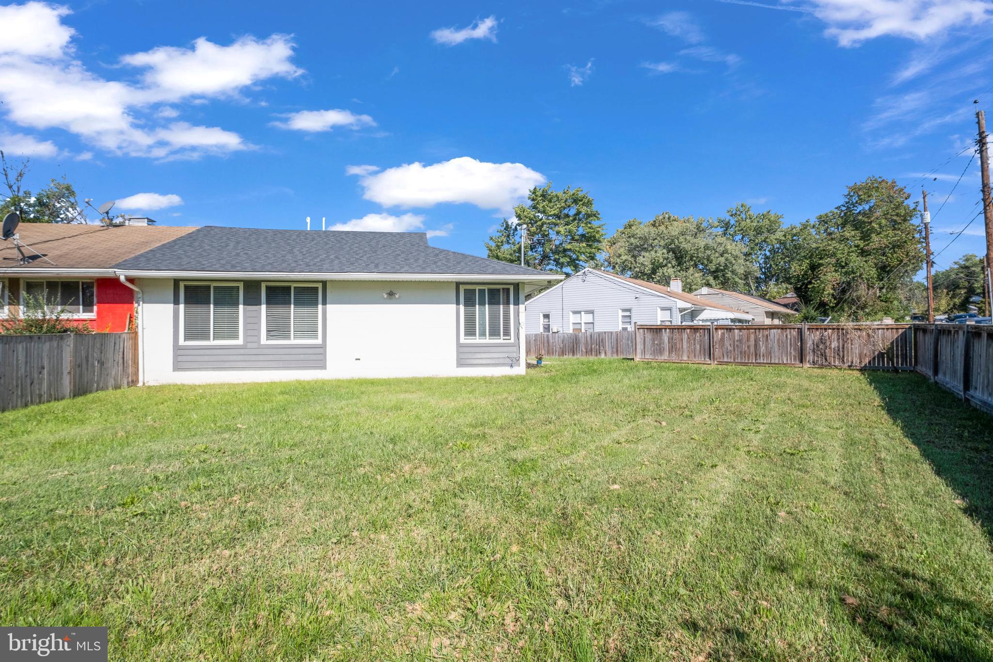 7600 Normandy Road Landover, MD 20785 - Photo 21 of 26 a view of a house with backyard and a garden