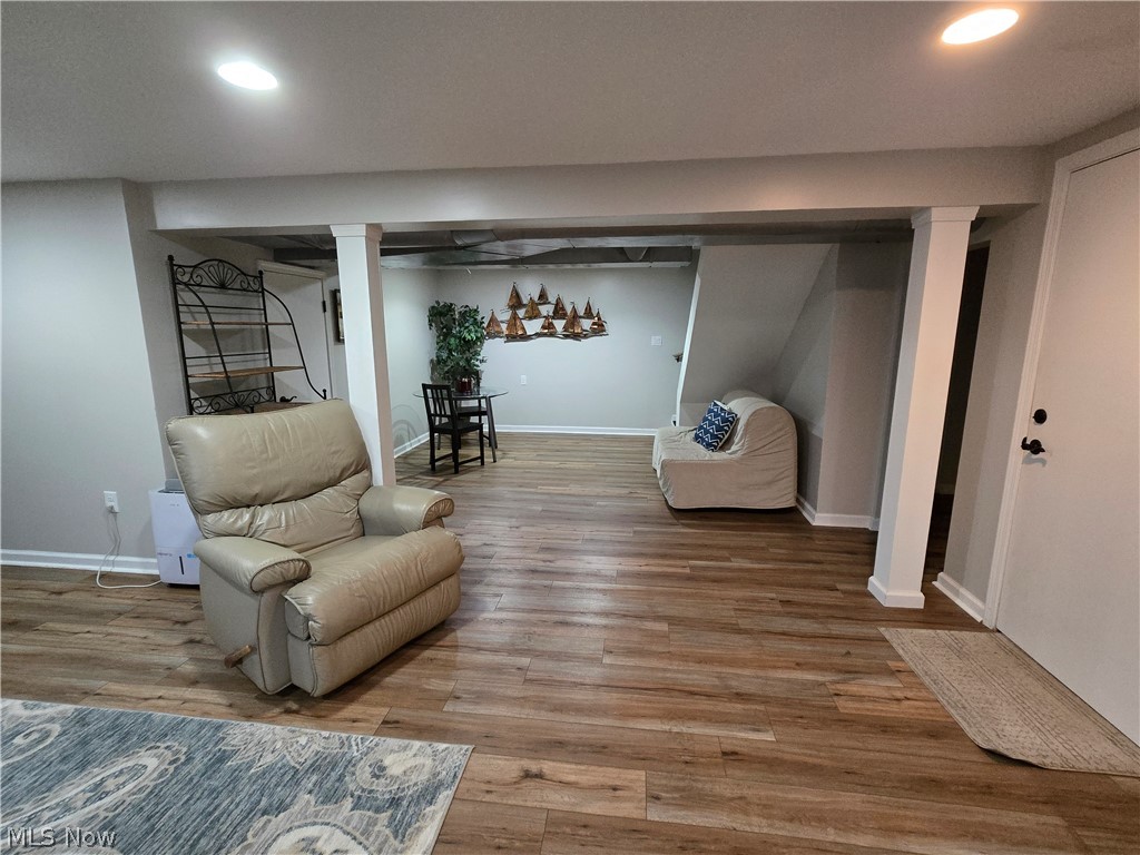 86450 Beaver Dam Road Scio, OH 43988 - Photo 7 of 28 Recessed lighting illuminates the wood-finish flooring in this open lower-level space