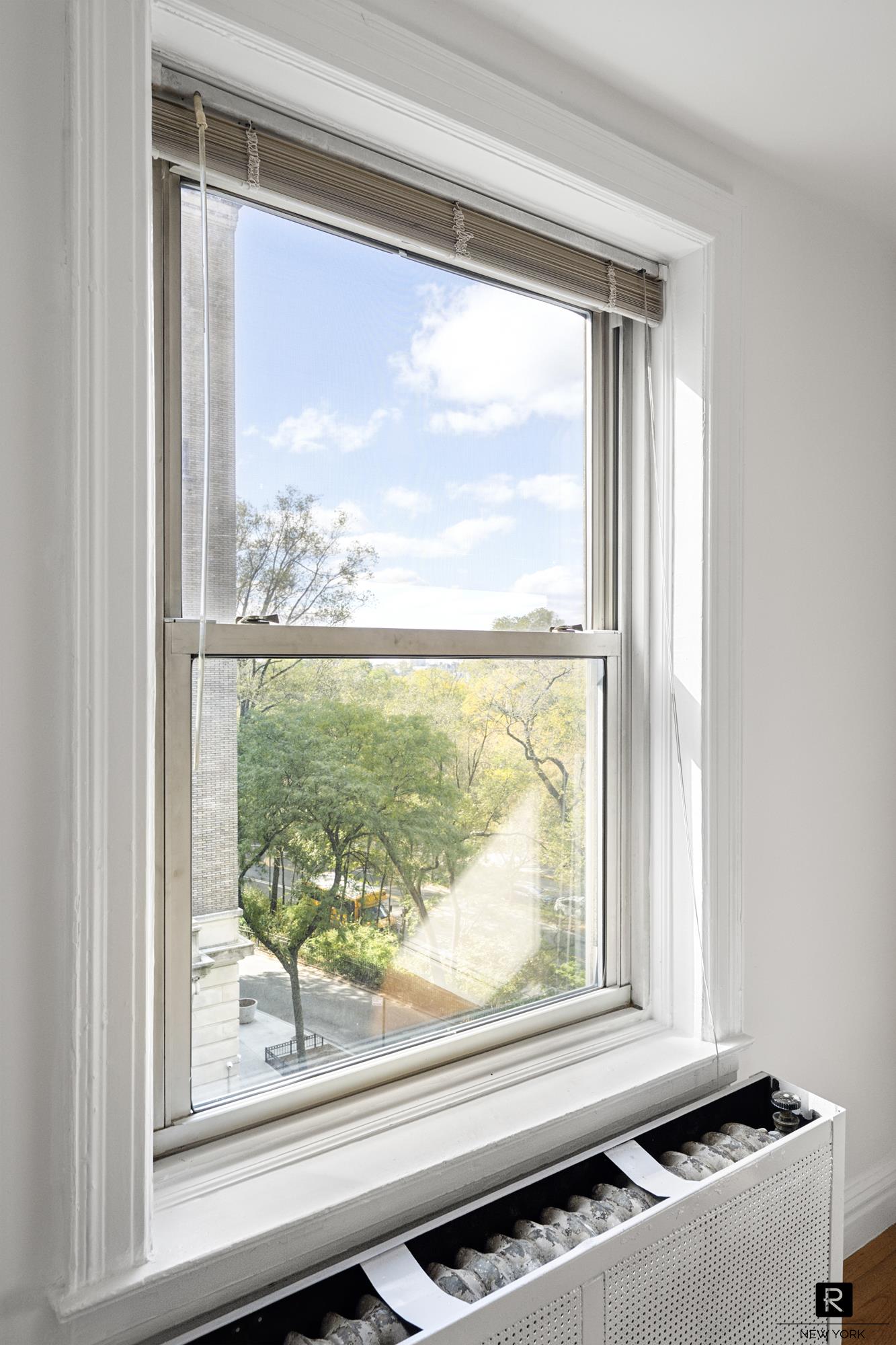 390 Riverside Drive, Unit 5G Manhattan, NY 10025 - Photo 5 of 14 a view of a room that has a large window