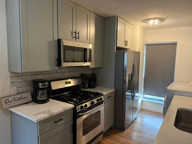 a view of backyard with seating space