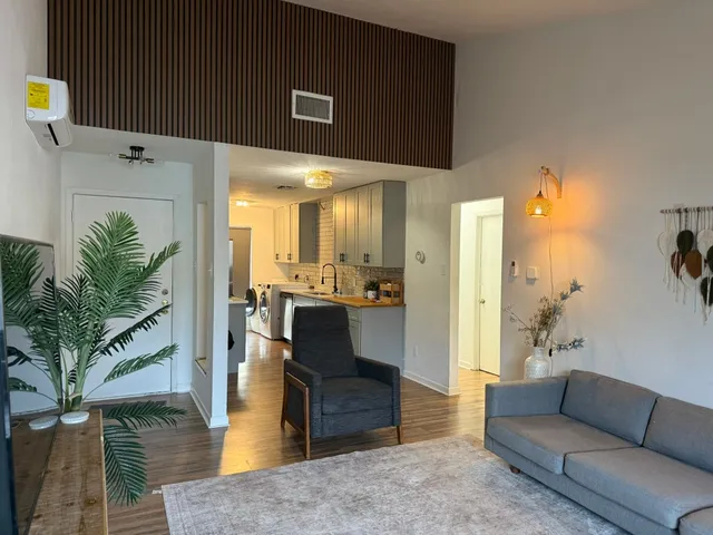 a kitchen with stainless steel appliances a sink stove and refrigerator