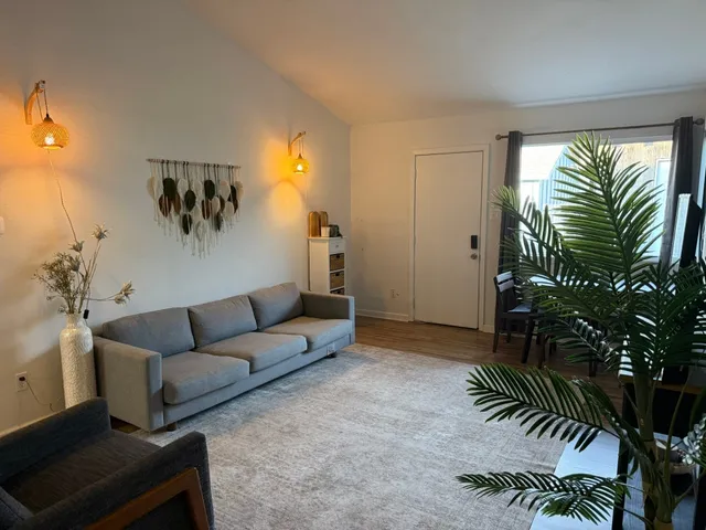 a kitchen with sink and cabinets