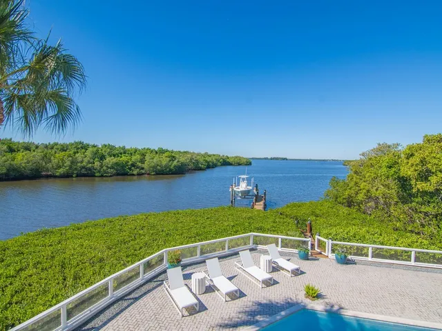 a view of a lake with a outdoor space