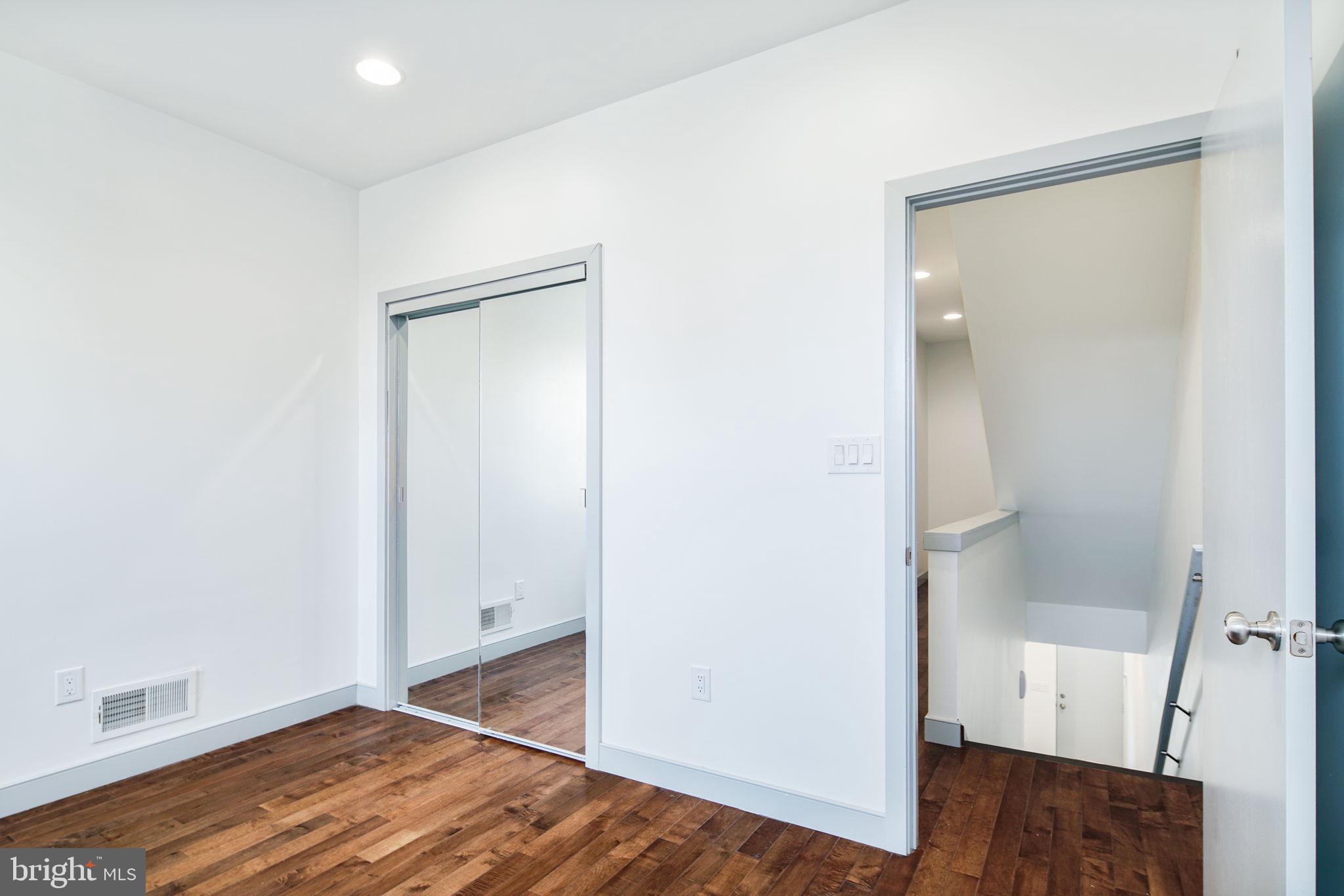 1235 North Taney Street Philadelphia, PA 19121 - Photo 11 of 28 a view of room with wooden floor