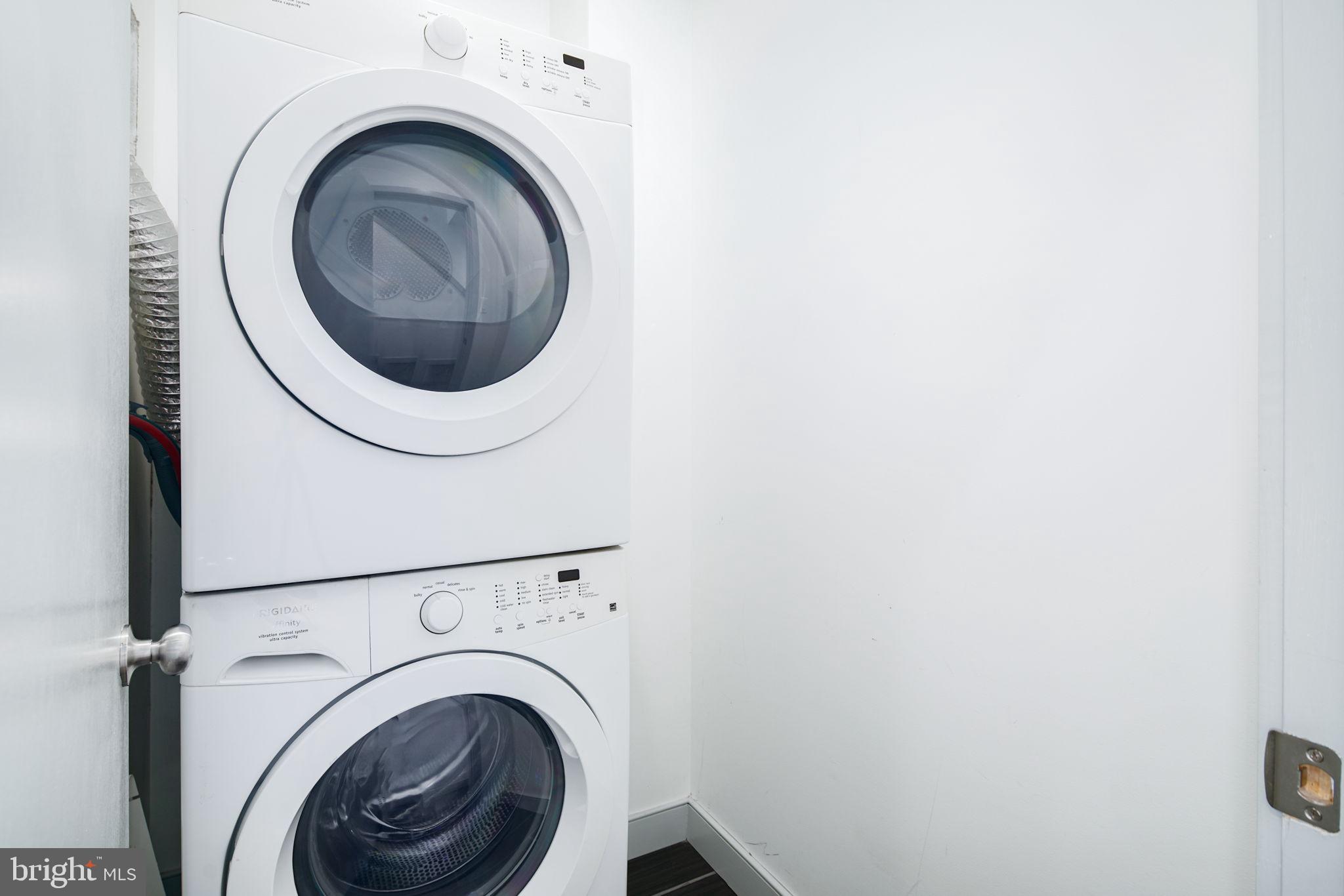 1235 North Taney Street Philadelphia, PA 19121 - Photo 14 of 28 a close up view of a washer and dryer