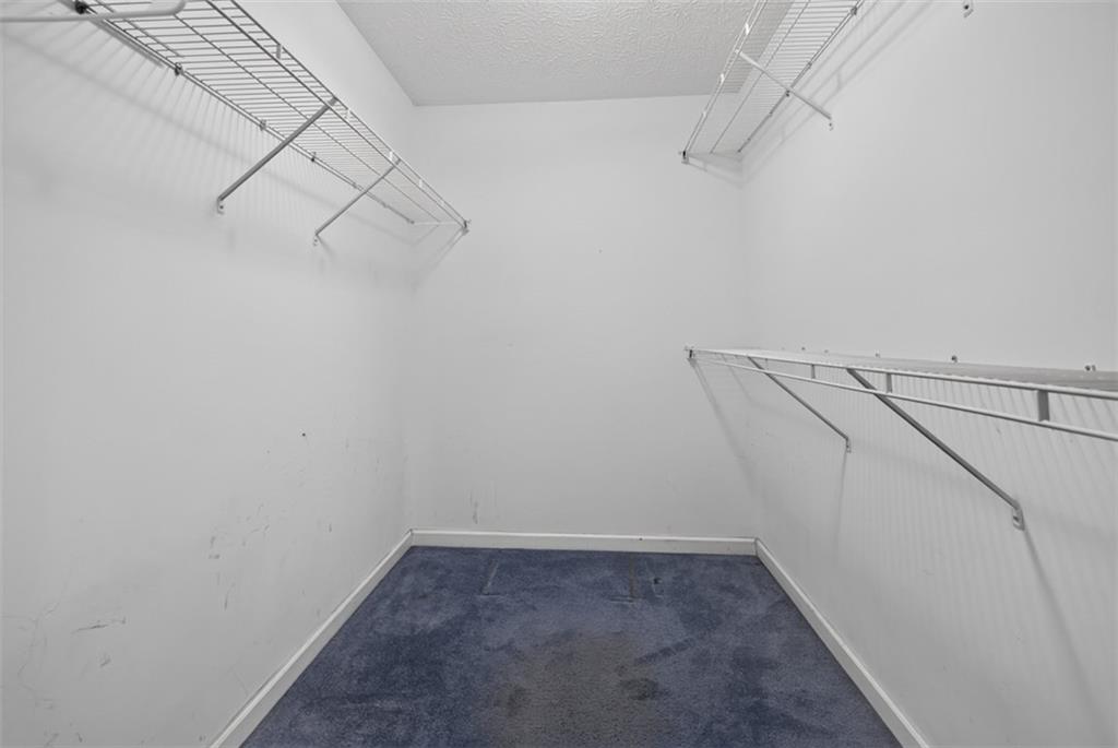 602 Pendergrass Road Winder, GA 30680 - Photo 27 of 44 a view of a room with racks on the wall