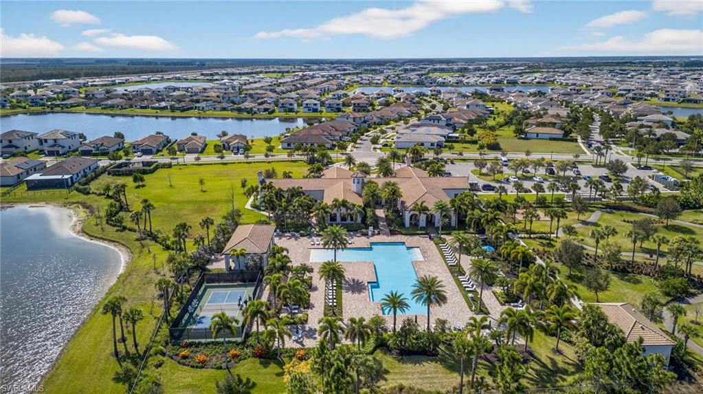5104 Isidora Lane Ave Maria, FL 34142 - Photo 27 of 28 an aerial view of residential houses with outdoor space