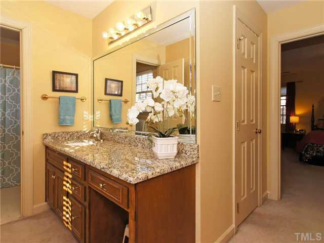 8316 Apple Orchard Way Raleigh, NC 27615 - Photo 13 of 25 Master bath features new granite with two separate vanities/full baths/walkin closets. Very unique in this price range! Master Bath/Spa