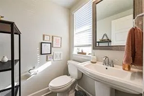 a swimming pool with outdoor seating and yard