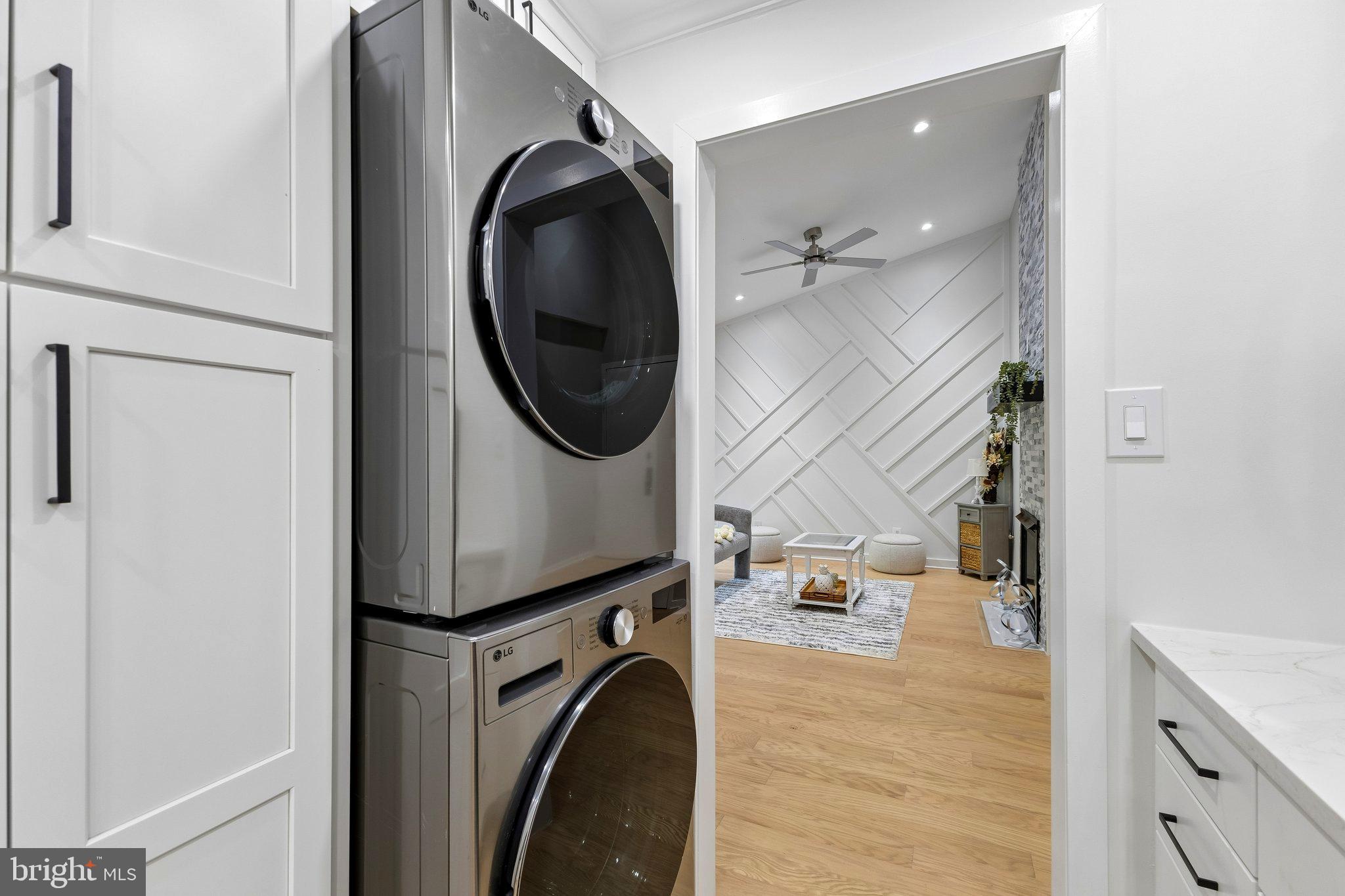 11841 Shire Court, Unit 31D Reston, VA 20191 - Photo 14 of 24 a utility room with dryer and washer