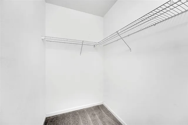 a view of small space with racks on the wall