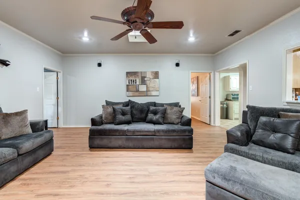 a kitchen with stainless steel appliances granite countertop a sink and a stove