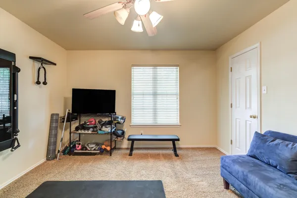 a backyard of a house with lots of green space