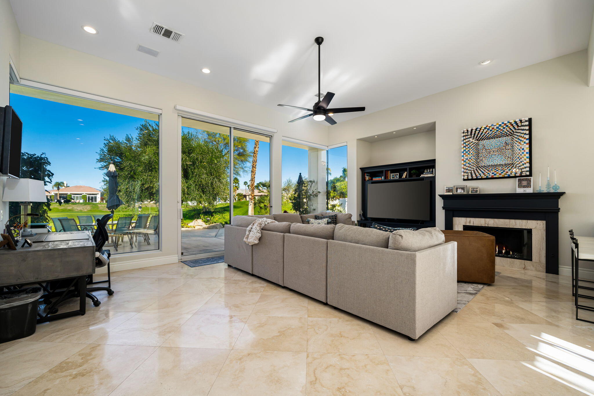 275 Loch Lomond Road Rancho Mirage, CA 92270 - Photo 12 of 29 a living room with furniture and a fireplace