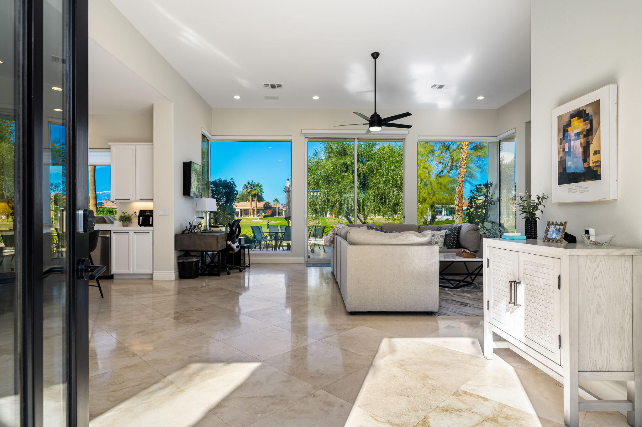 275 Loch Lomond Road Rancho Mirage, CA 92270 - Photo 13 of 29 a living room with furniture and a large window