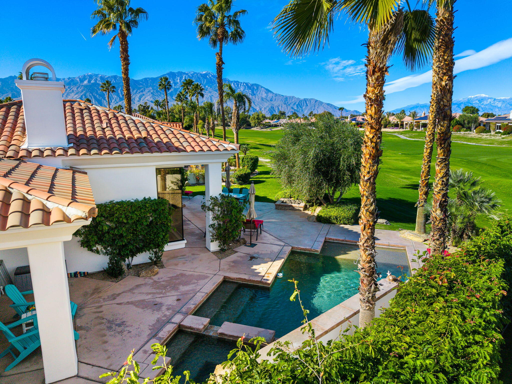 275 Loch Lomond Road Rancho Mirage, CA 92270 - Photo 26 of 29 an outdoor space with seating area and trees