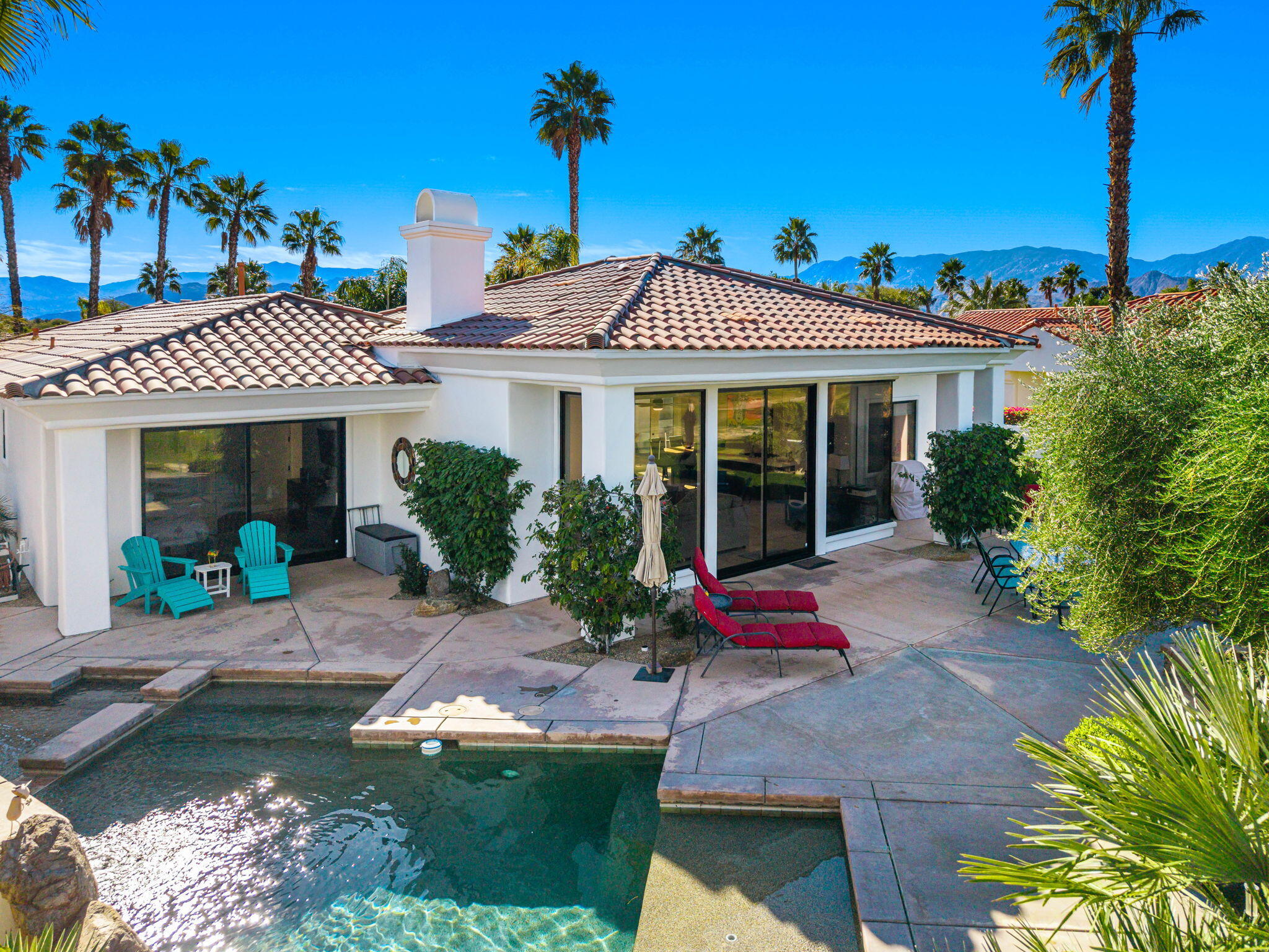 275 Loch Lomond Road Rancho Mirage, CA 92270 - Photo 28 of 29 a front view of a house with garden