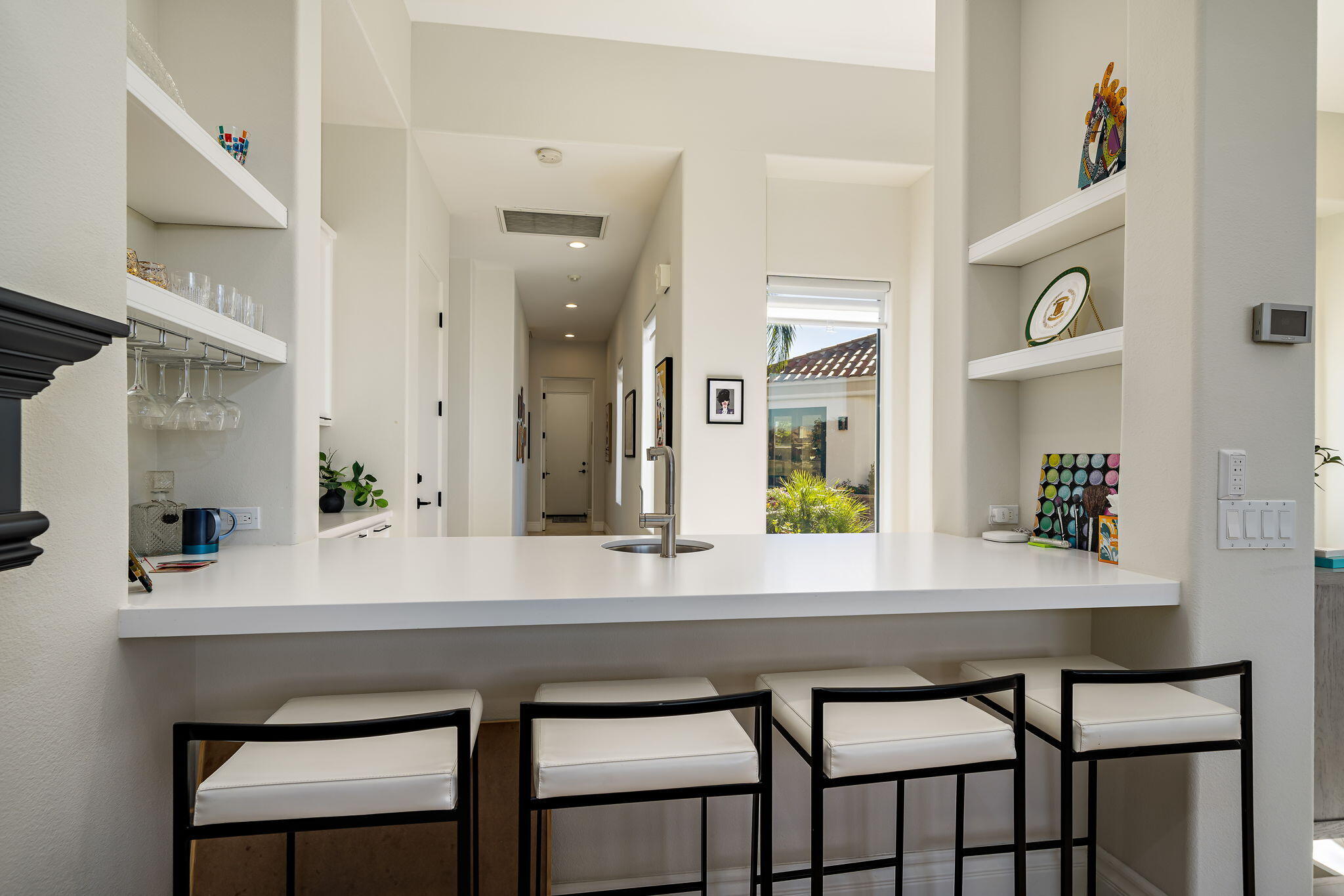 275 Loch Lomond Road Rancho Mirage, CA 92270 - Photo 10 of 29 a kitchen with a table and chairs in it