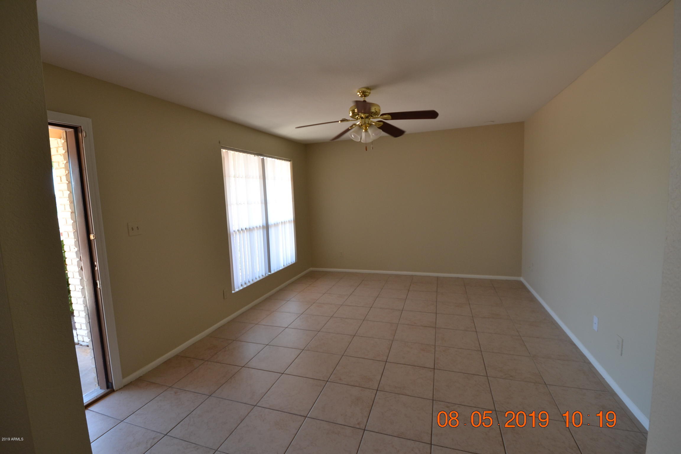 1431 West Behrend Drive Phoenix, AZ 85027 - Photo 8 of 15 a view of an empty room with a window